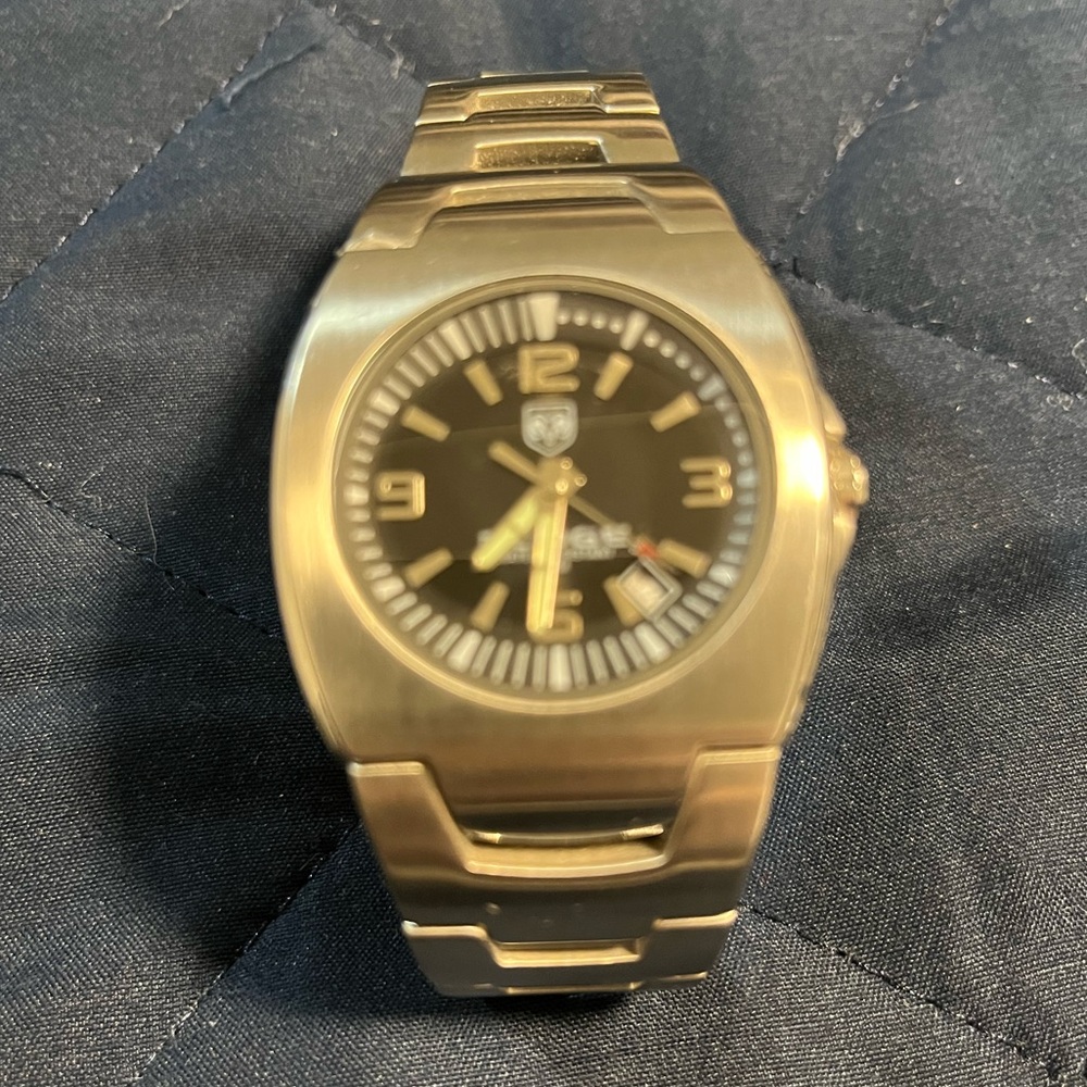 Men’s Authentic Dodge Wear silver watch.